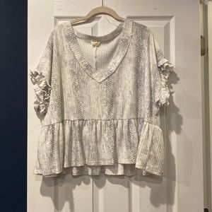 Snakeskin peplum style shirt